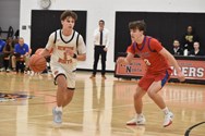 Teagan Swint, Nick Spinelli lead Newton North boys basketball past Natick 