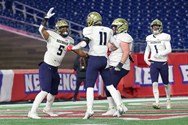 Needham football’s seniors stand together for their town